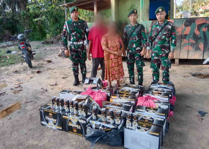 Satgas Pamtas Yonarmed 11 Kostrad Gagalkan Penyelundupan Ratusan Kaleng Miras dari Malaysia