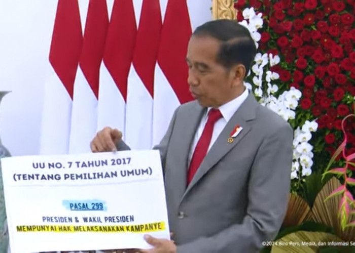 Bawa Poster, Jokowi Jelaskan Pasal Presiden Boleh Kampanye 