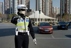 China Pekerjakan Robot Polisi saat Libur Hari Buruh Internasional