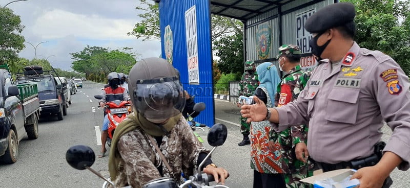 Masker Untuk Hindari COVID-19, Tapi Helm Juga Wajib